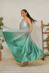 Mint to teal ombré satin gown - movement shot showing fabric flow