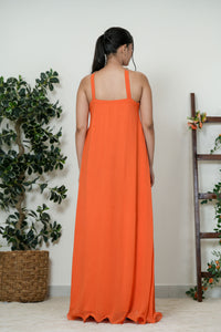 Orange Embellished Cross-Halter Maxi Gown - Front View with Clutch