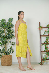 Yellow schiffli eyelet midi dress - three-quarter side view