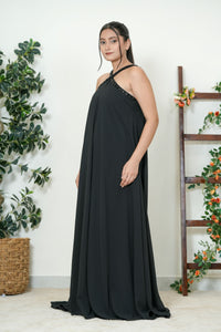 Black chiffon halter maxi gown - side view showing voluminous A-line silhouette