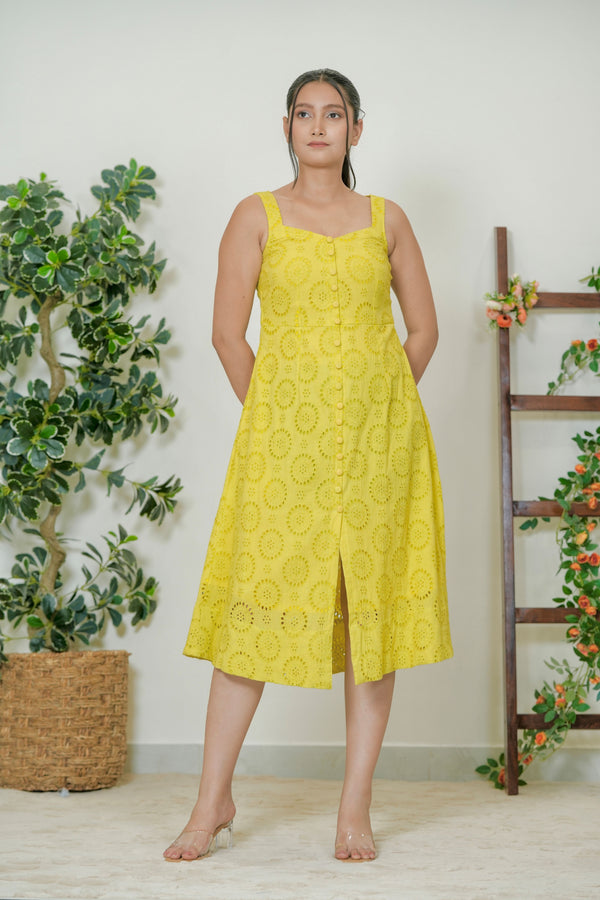 Yellow schiffli eyelet midi dress - side view showing A-line silhouette and side slit
