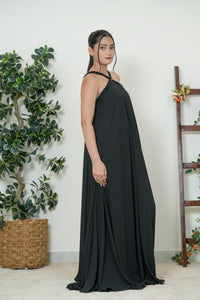 Black chiffon halter maxi gown - second side view showing fluid chiffon drape