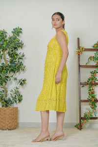Yellow schiffli eyelet midi dress - back view showing wide straps
