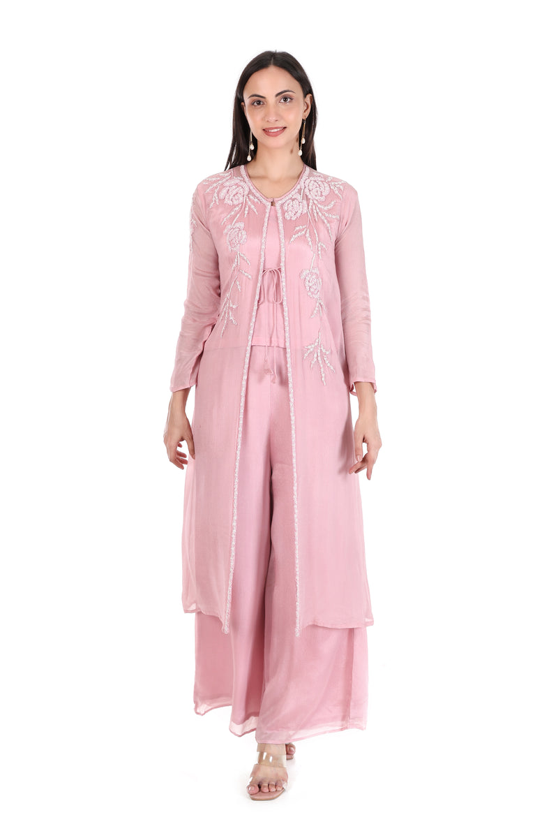 Front view of blush pink floral embroidered jacket with matching inner top and wide-leg palazzo trousers