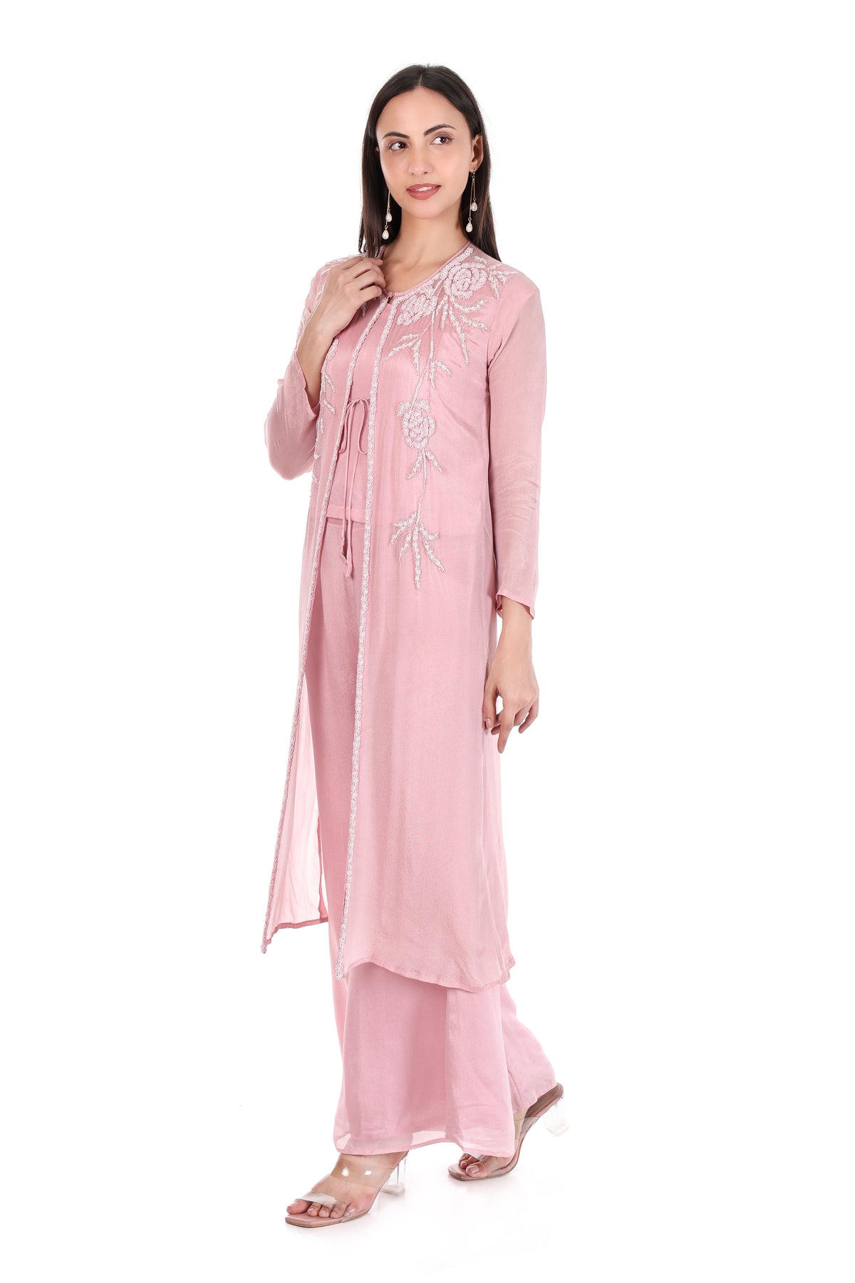 Angled front view of blush pink embroidered jacket and palazzo set